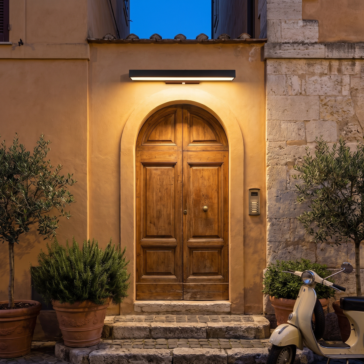 LED linear wall light above an Italian townhouse front door