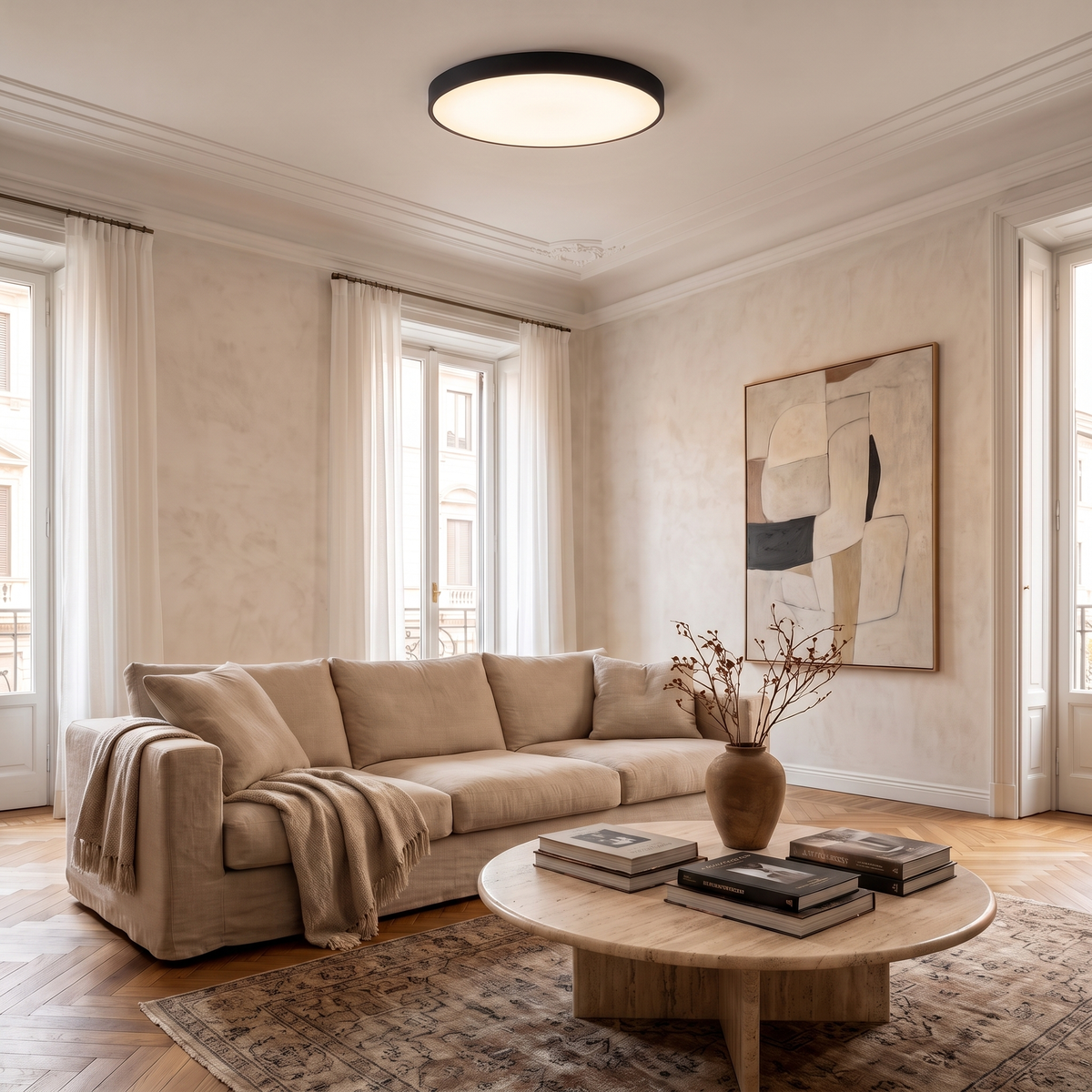 Slim round LED ceiling light glowing evenly in an elegant Italian living room