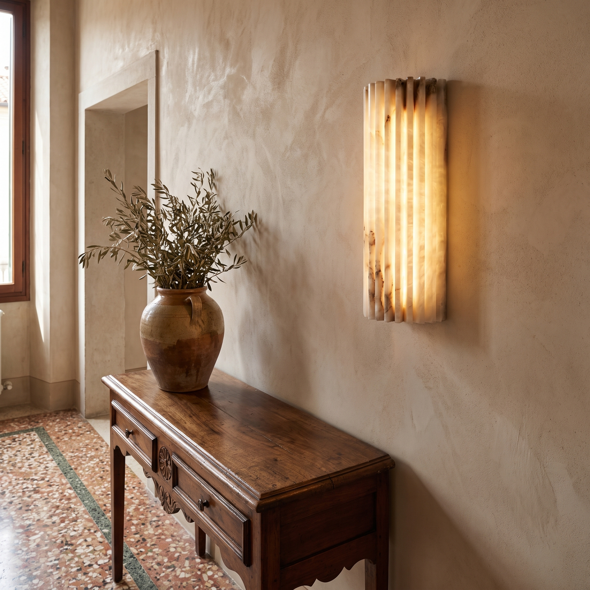 Ribbed Alabaster Wall Sconce in a warm Italian interior