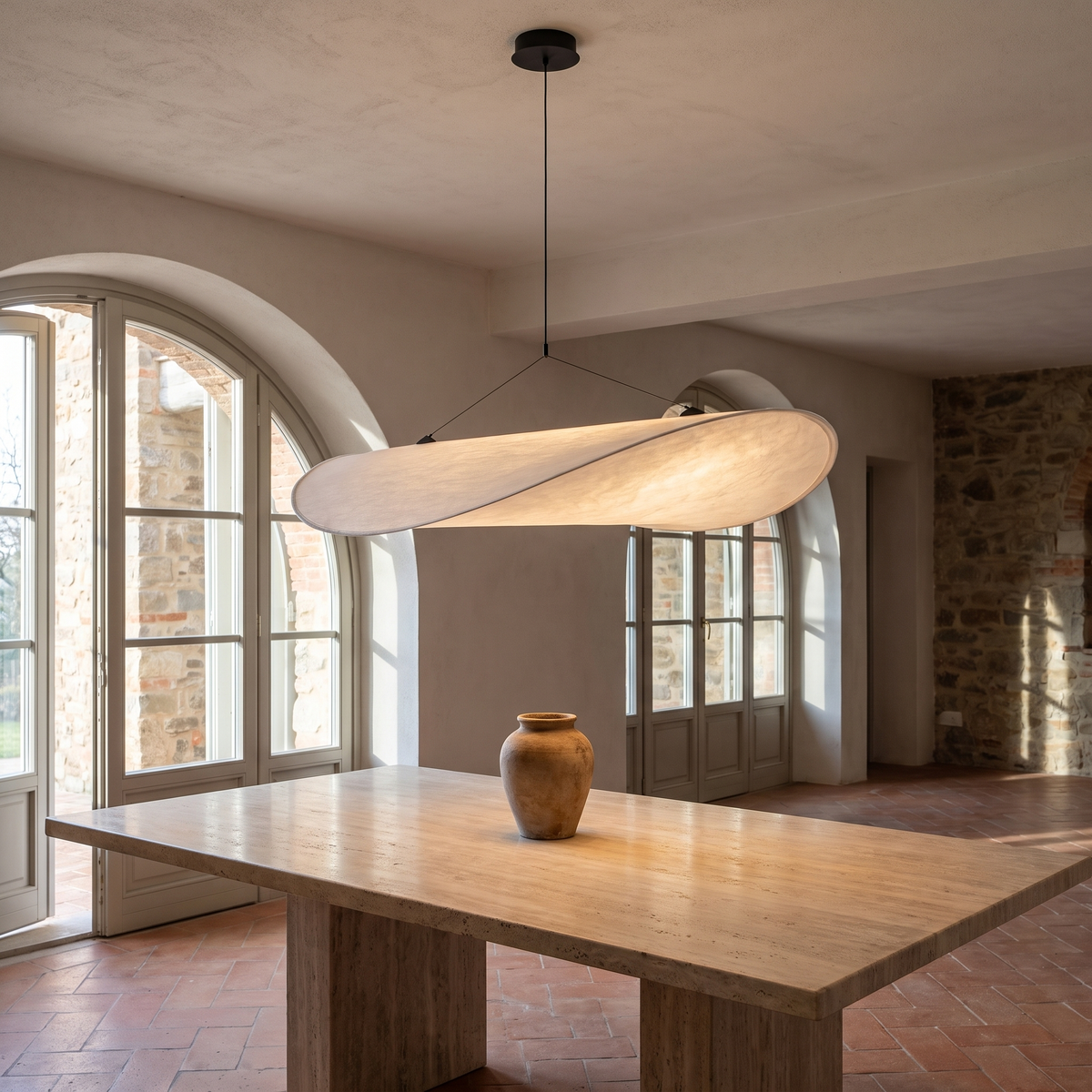 Floating Disc Pendant Light in a warm Italian interior