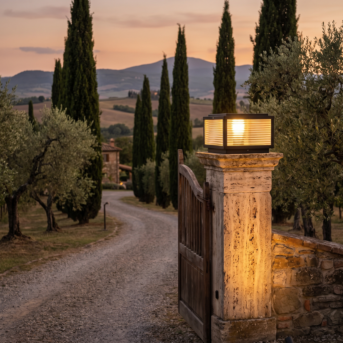 Square pillar light on a stone gate pillar at an Italian villa